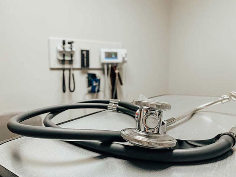 Stethoscope laying on a table in a doctor's office